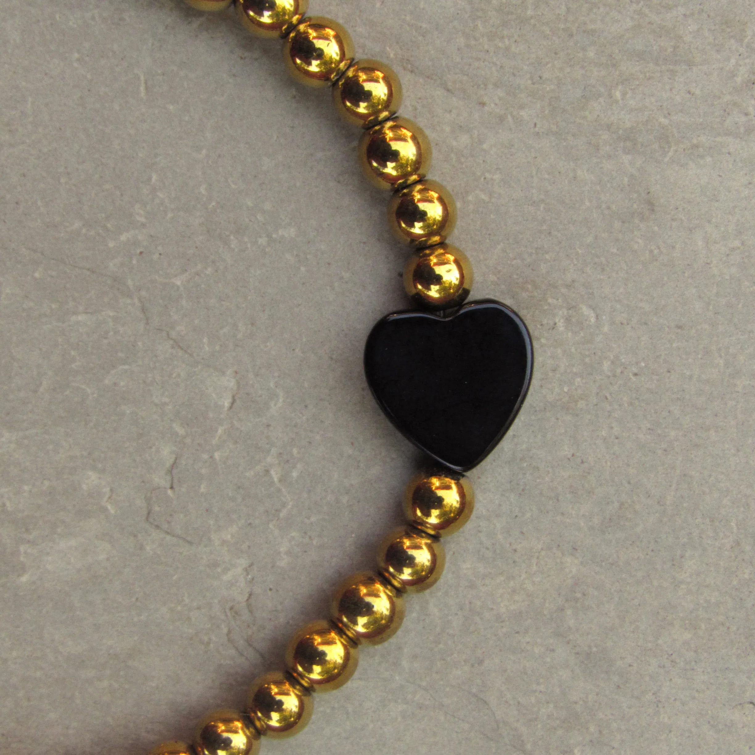 Gold Hematite and Onyx gemstone Heart COURAGE bracelet