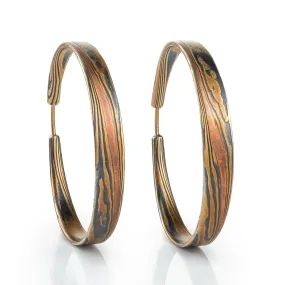 Mokume Gane Twist Pattern Hoop Earrings in Spark with Red Gold Stratum